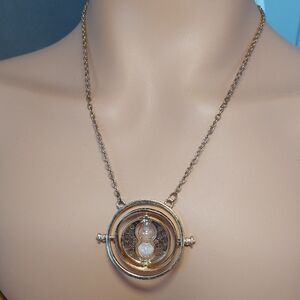 Rotating Hourglass Pendant Necklace | Gold Tone 22"